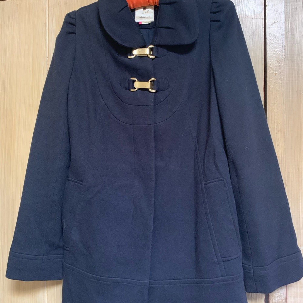 Blue coat with hook clasps